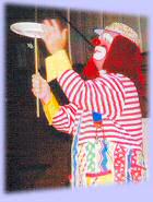 photo of DA the Clown spinning a plate